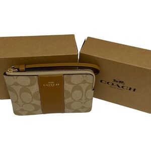 Corner Zip Wristlet In Signature Canvas